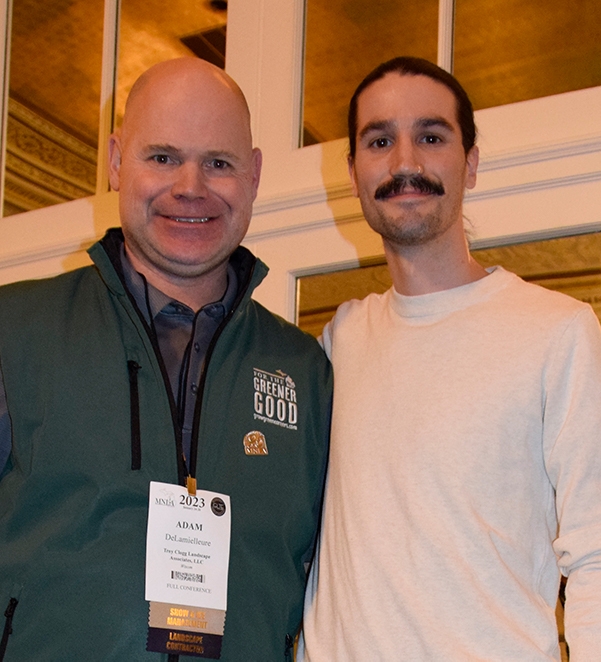 Ian Holcomb (right) with MNLA President Adam DeLamielleure